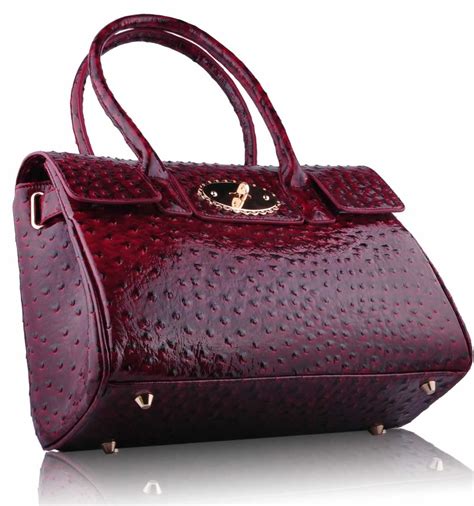 burgundy leather satchel bag.